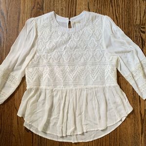 Worn once Miami embroidered top lots of details size Small in cream color